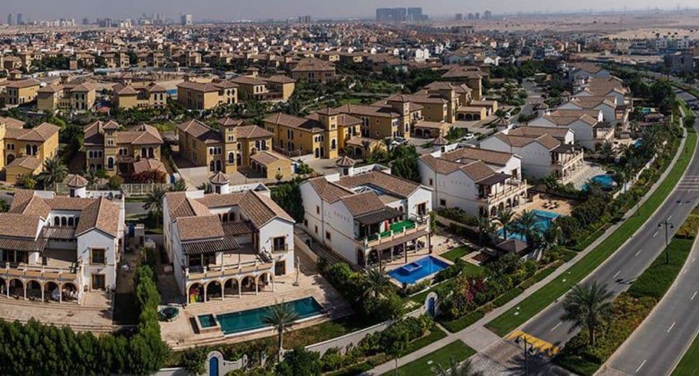 Where can you invest in a four-bedroom under AED 4M in Dubai?